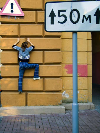 climbing up the wallsの写真素材