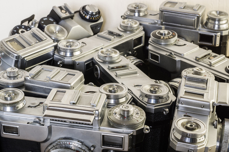 Vintage collection of old cameras on a white background.の写真素材