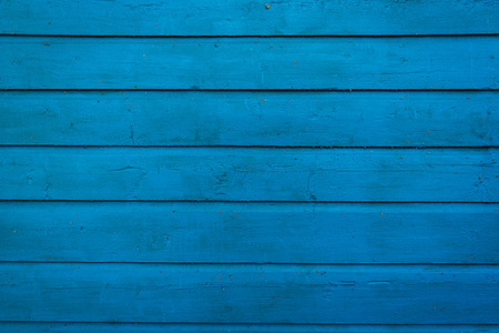 Old painted  blue wooden wall. Wood plank texture backgroundの写真素材