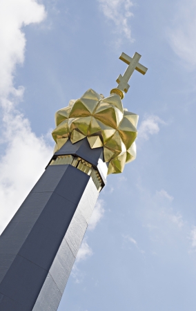 Cross at monument to heroes of the Borodino battle on Rajevski battery against the bright sky の写真素材