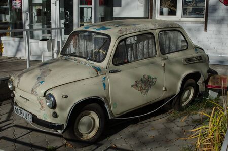 Zaporozhets with pictures of old curtains as an advertisement for a flower shopのeditorial素材