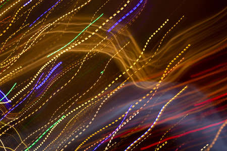 Abstract background of Christmas lights with long exposure.