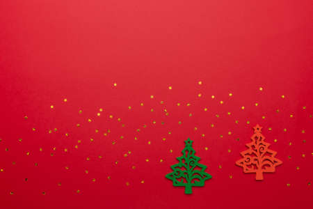Festive background with Christmas tree toy, stars, glitter. Christmas background with copyspace....