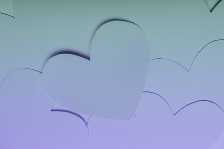 Paper elements in shape of heart on gradient background. Concept symbol of love for Happy Women's,...