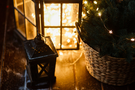 Self-made big lantern with LED lights garland - The dark nights of winter have already arrived and Christmas is coming soon.の写真素材