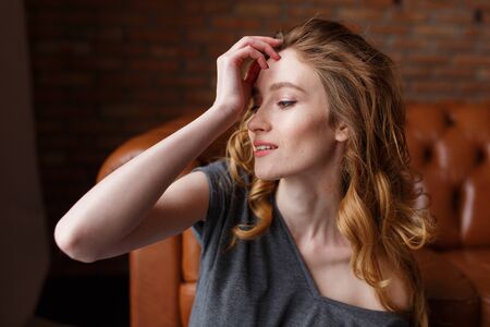 Beauutiful young woman with red hairの写真素材