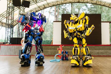 Bumblebee and optimus prime costumed actors for birthday party.のeditorial素材