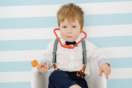 Handsome Little Boy Young Doctor with Stethoscopeの写真素材