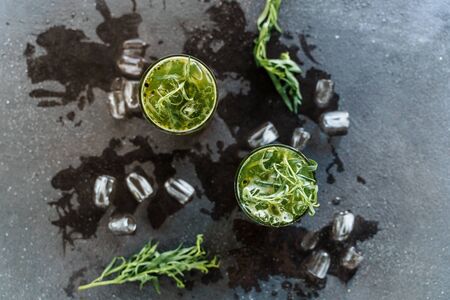 Cup of Tarragon and Passion Fruit Drink Flat Layの写真素材