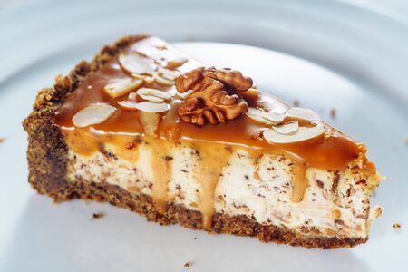 Tasty Cheesecake with Caramel and Walnut Closeupの写真素材