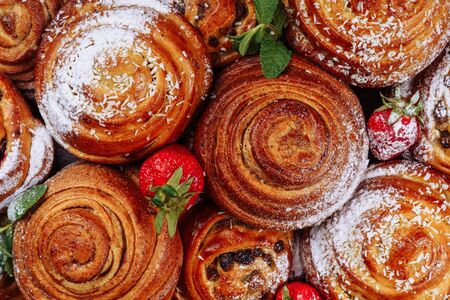 Cinnamon Bun Sweet Roll Pastry Top View Closeupの写真素材