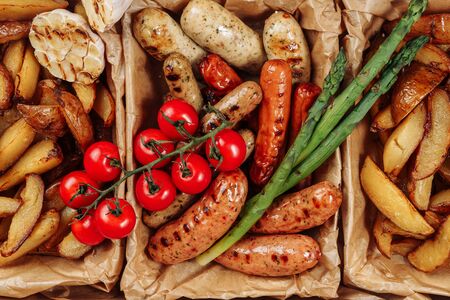 Sausage Potato Fresh Tomato Box Delivery Closeupの写真素材