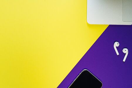 Laptop Phone Earphone Yellow Freelance Work Deskの写真素材