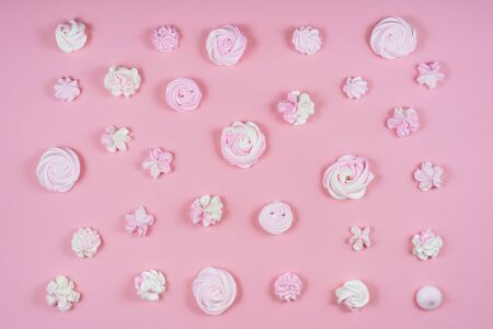 Pink Meringue Sweet Birthday Cake Pattern Flat Lay. Dessert Food Party Seamless Concept Flatlay. Fresh Marshmallow Bakery Overhead View. Variety Candy Set Minimal Trendy Color Wallpaper Top Downの写真素材