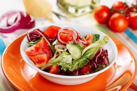 Fresh Healthy Red Vegetable Spring Salad Bowl Sideの写真素材