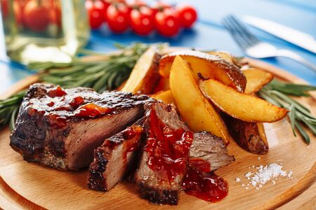 Roasted Steak Pork Meat Sliced with Potato Ketchupの写真素材