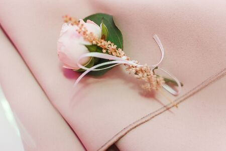 Dining table setting at Provence style, with small rose flower, beige napkin. Close-up horizontal viewの写真素材