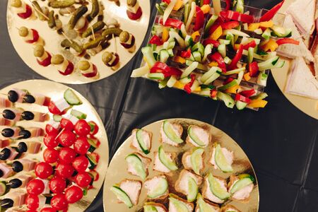 Top view of catering services background with snacks sandwiches on guests table in restaurant at event partyの写真素材