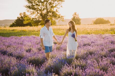 Love Couple in Lavender Field Spend Romantic Timeの写真素材
