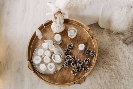 Snow Maiden Toy Statuette, Snowy Pine Tree Conesの写真素材