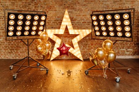 Star Frame with Lamps Decoration and Air Balloons. Scattered Confetti and Professional Illumination...
