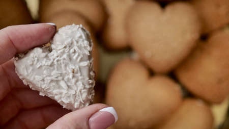 Heart-shaped cookies for Valentines Day. Background image with sweets.