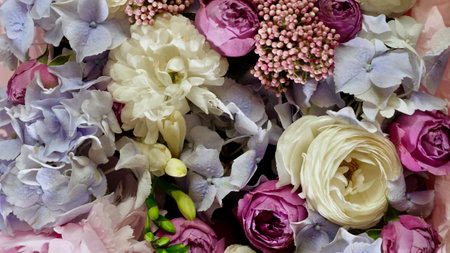 Floral natural background with blue gardenia, pink rose, white chrysanthemum close-upの写真素材