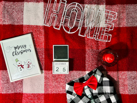 New Years holiday, Christmas Eve at home with a Christmas tree, candles, postcards, handouts, gifts, present, boxes, laptop, phone. Workplaceの写真素材