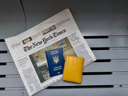 Ukrainian Refugee Passpart, money euro, popular newspaper The New The New York Times about Ukraine...