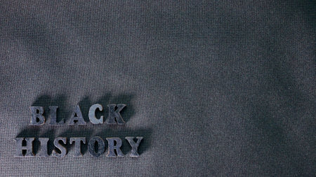 Inscription text Black History Month on dark isolated background close up. Celebrating the African American Conceptual Holiday for Equalityの写真素材