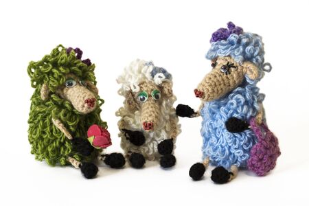 Handmade knitted toys (glamorous sheep) isolated on white backgroundの写真素材