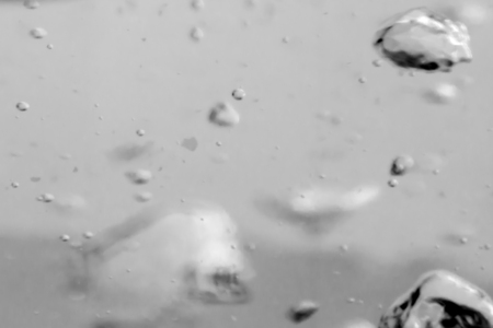 Studio photography of bubbles boiling water in an electric kettleの写真素材