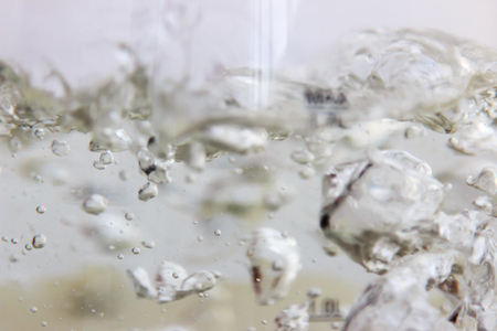 Studio photography of bubbles boiling water in an electric kettleの写真素材