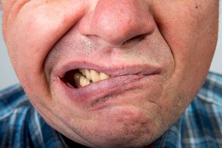 Emotion of the face of a middle-aged man that are not visible to others