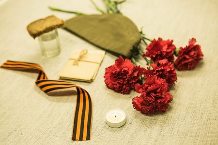 Victory Day. We remember the exploits of our grandfathers. Front cap, candle, letters from the front...