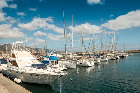 Yachts moored in the marina of the island of Tenerife Canary archipelago.の写真素材