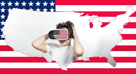 The concept of positive emotions. A young man enjoys life. Collage against the background of the American flag. The portrait of the man is inscribed in the contours of the map of the United States.の写真素材