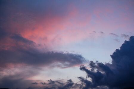 Cloud. Stormy pink clouds against the blue sky. Nature is the best artist.