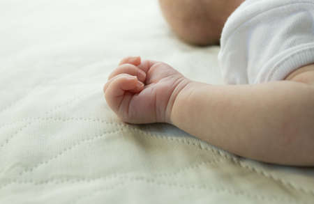Children Babies. Child care. Small hand of a newborn baby.