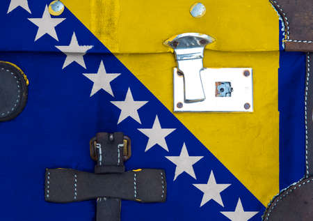 Bosnia flag is on texture. Template. Coronavirus pandemic. Countries are closed. Locks.の写真素材