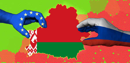 The flag of Belarus is inscribed in the contour map of the country. Hands with applied flags of the European Union and Russia are stretching the map of Belarus.の写真素材