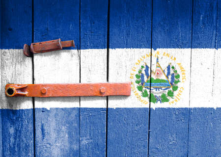El Salvador flag is on texture. Template. Coronavirus pandemic. Countries may be closed. Locks.の写真素材