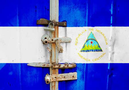Nicaragua flag is on texture. Template. Coronavirus pandemic. Countries may be closed. Locks.