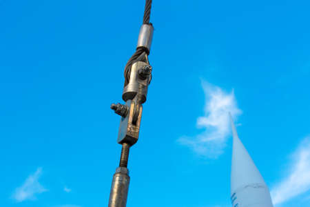 Fixing in technology. Cable-stayed mounting option. Fastening stretching.