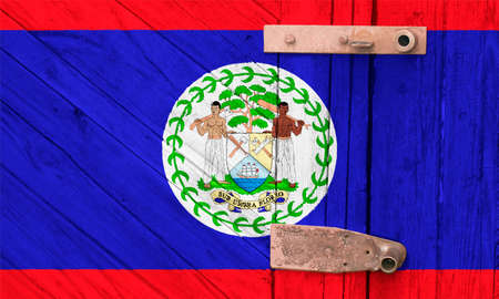 Belize flag is on texture. Template. Coronavirus pandemic. Countries may be closed. Locks.の写真素材