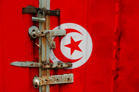 Tunisia flag is on texture. Template. Coronavirus pandemic. Countries may be closed. Locks.の写真素材