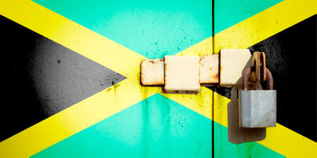 Jamaica flag is on texture. Template. Coronavirus pandemic. Countries may be closed. Locks.の写真素材