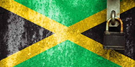Jamaica flag is on texture. Template. Coronavirus pandemic. Countries may be closed. Locks.の写真素材
