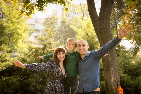 Halloween. Happy family - mom, dad and son at a Halloween picnic. Emotion concept. The boy and his...