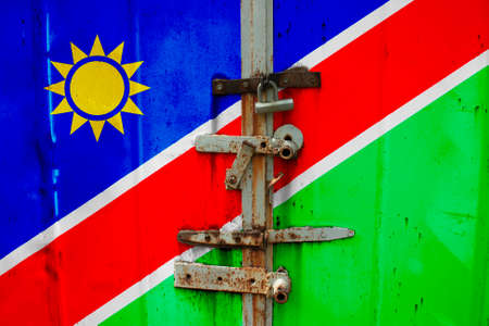 Namibia flag is on texture. Template. Coronavirus pandemic. Countries may be closed. Locks.の写真素材